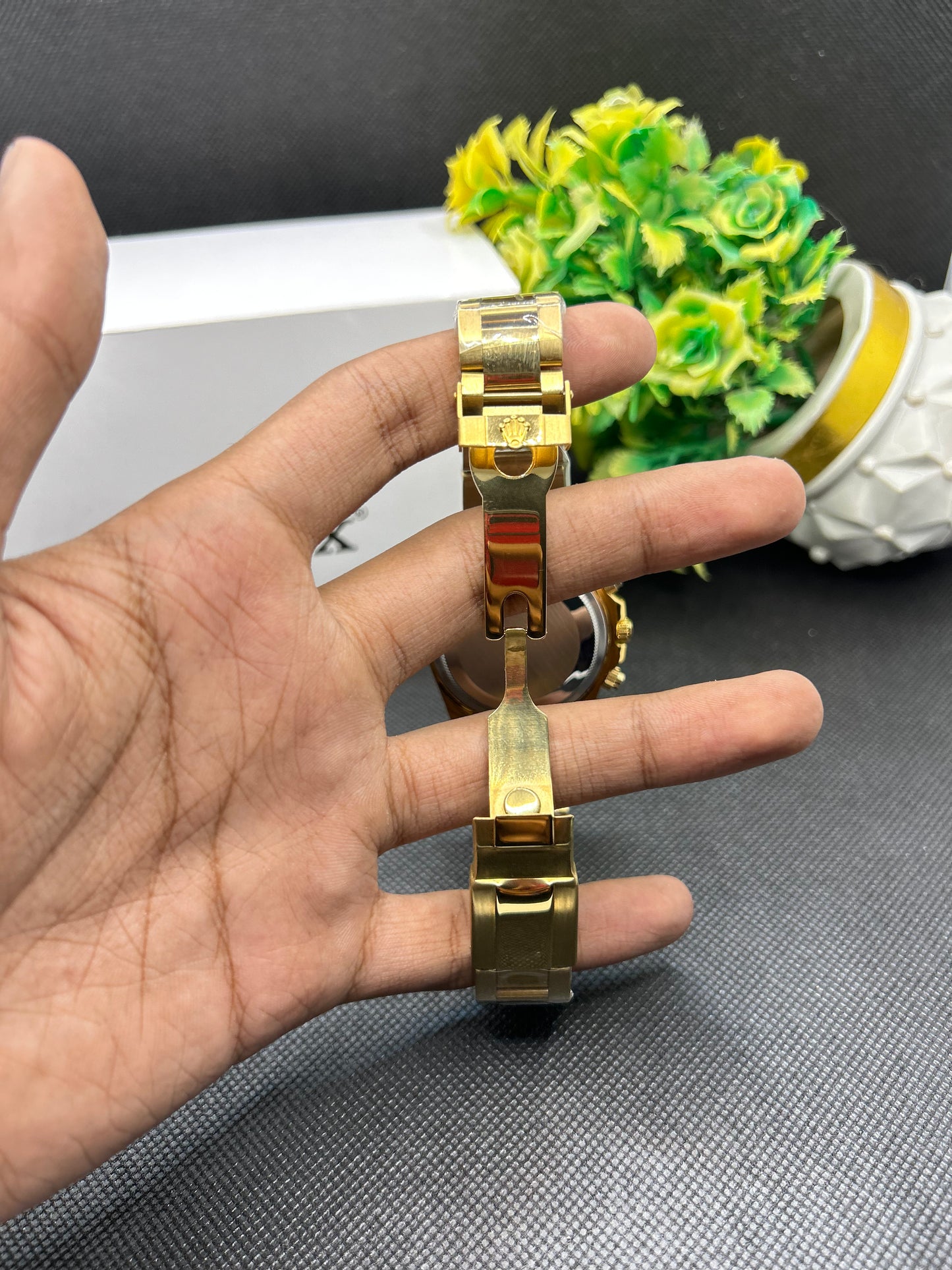 Rolex Daytona rainbow in golden strap