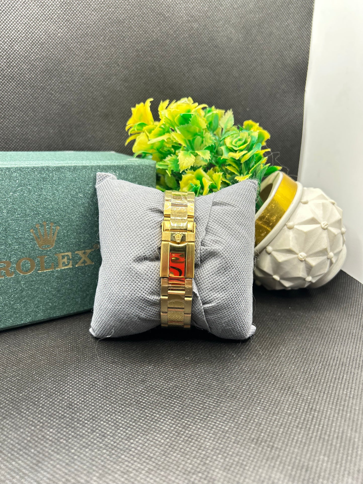 Rolex Daytona rainbow in golden strap