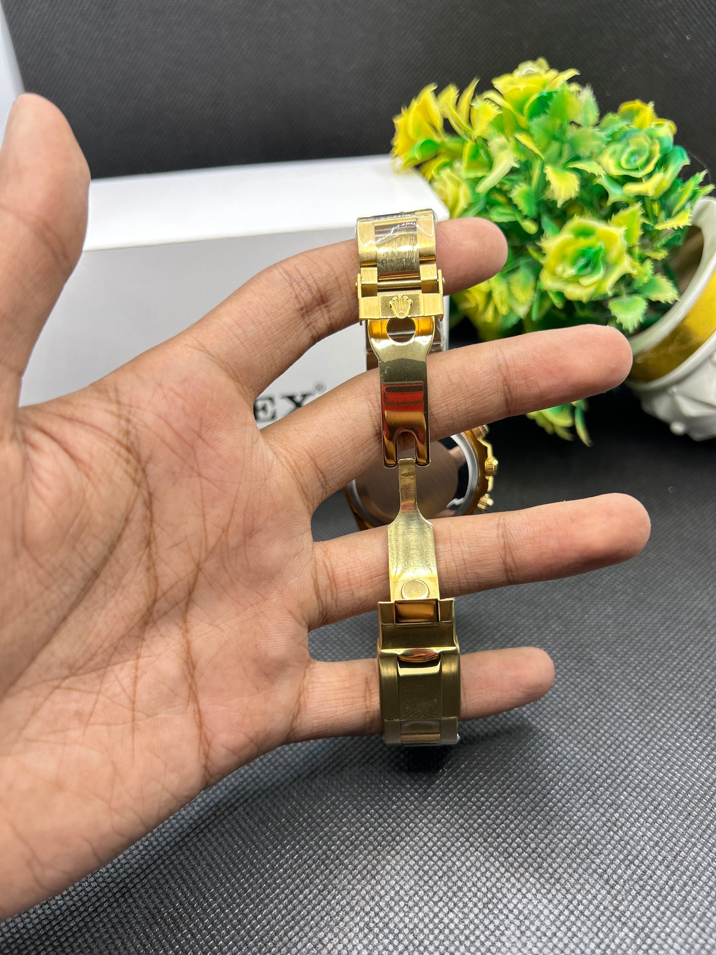 Rolex Daytona rainbow in golden strap