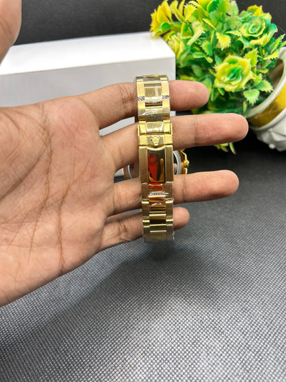 Rolex Daytona rainbow in golden strap