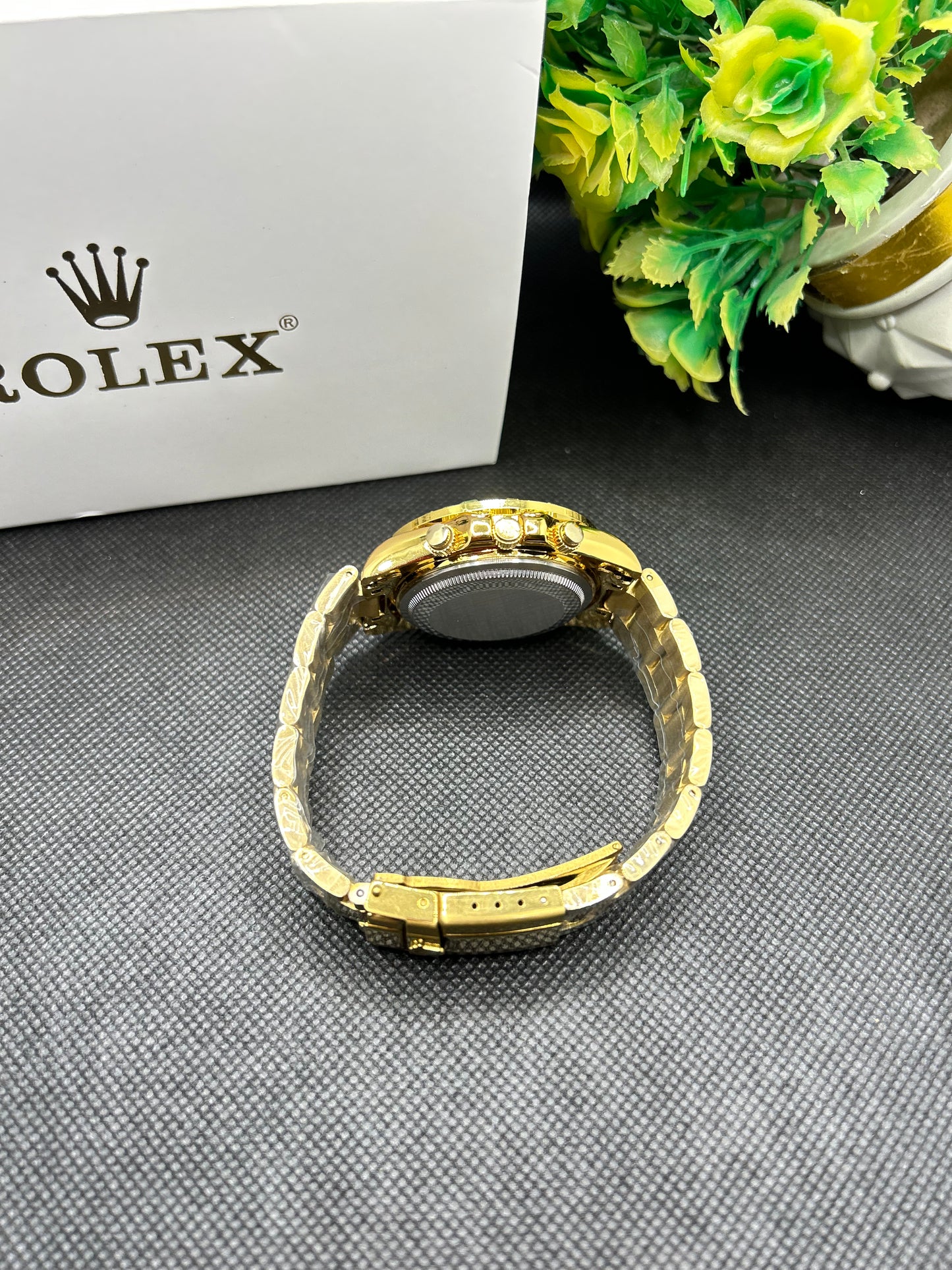 Rolex Daytona rainbow in golden strap